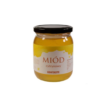 Miód cytrynowy 650g w słoiku na białym  tle