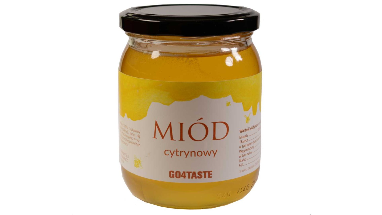 Miód cytrynowy 650g w słoiku na białym  tle