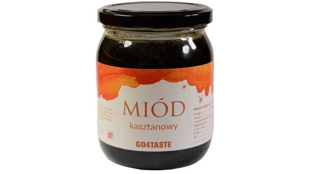 Miód kasztanowy 650g w słoiku na białym tle