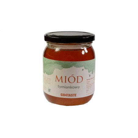 Miód tymiankowy 650g w słoiku na białym tle