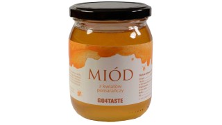 Miód pomarańczowy 650g w słoiku na białym tle