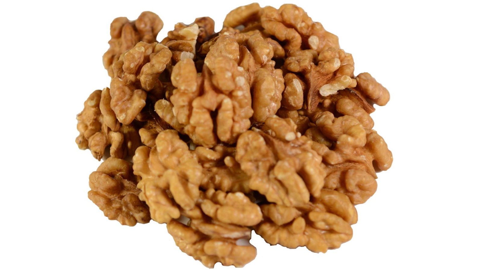 orzechy włoskie z Chile połówki luzem na stole