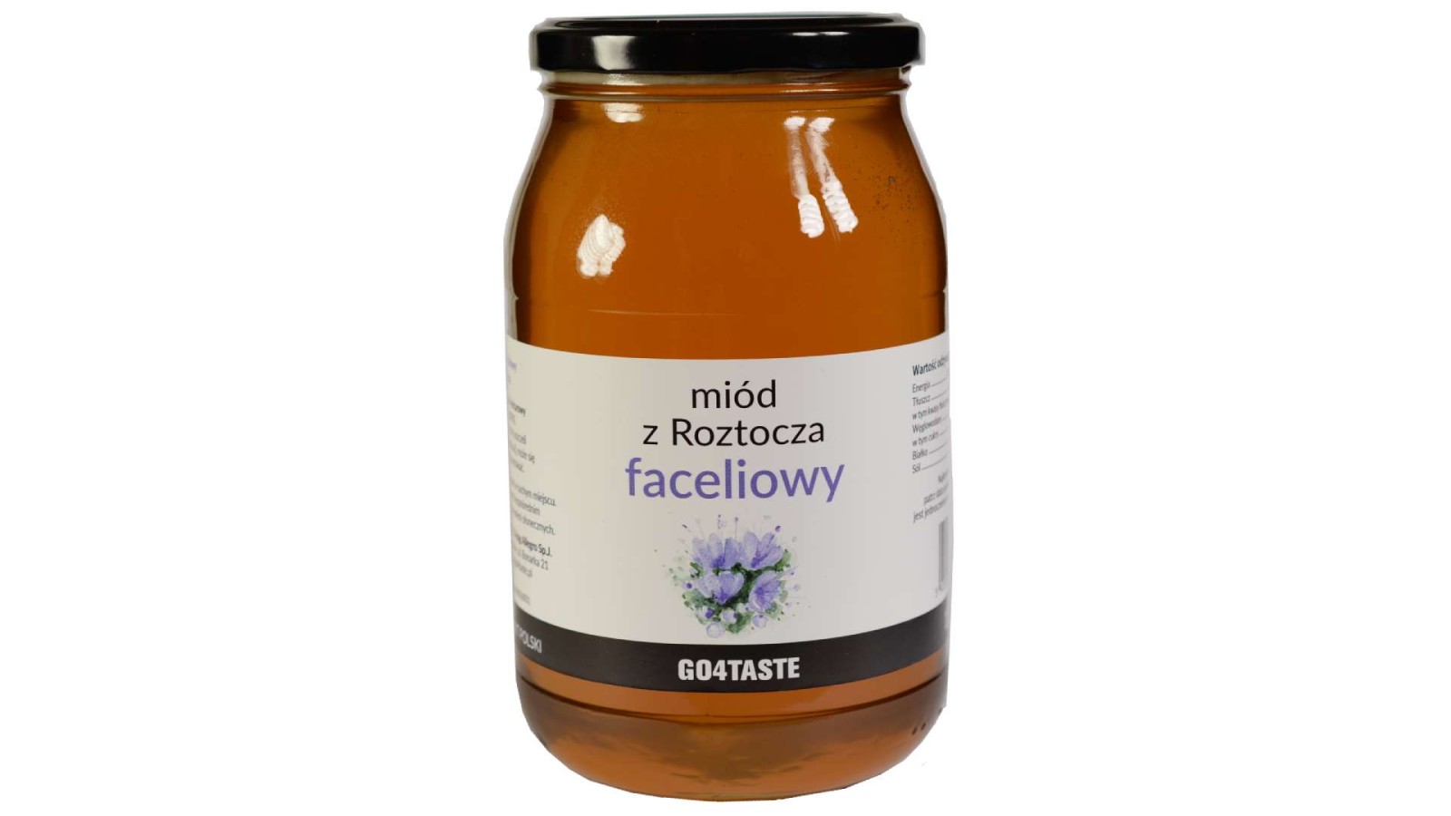 Miód faceliowy o lekko cytrynowym smaku zamknięty w szklanym opakowaniu 1.3kg