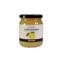 Miód cytrynowy 650g w słoiku na białym tle