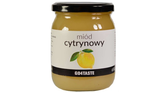 Miód cytrynowy 650g w słoiku na białym tle